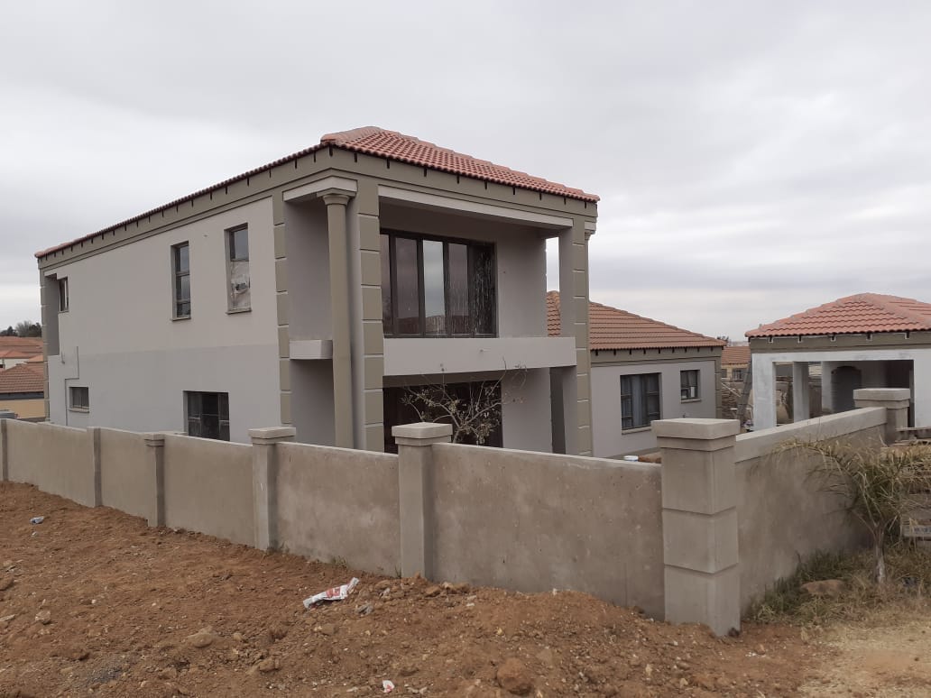 Double-storey house with boundary wall complete